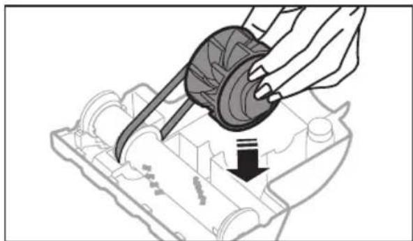 Illustration of a hand using a tool to adjust or install a mechanical component, with no visible text or symbols.