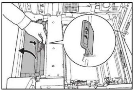 Technical diagram showing a hand operating a device with an inset close-up of the component, labeled with Chinese text.