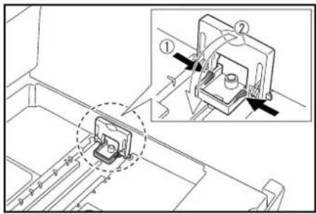 Technical diagram showing mechanical assembly with labeled components and directional arrows indicating movement or force