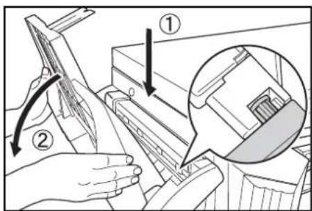 Technical diagram showing mechanical assembly with labeled parts and a magnified inset of a component detail