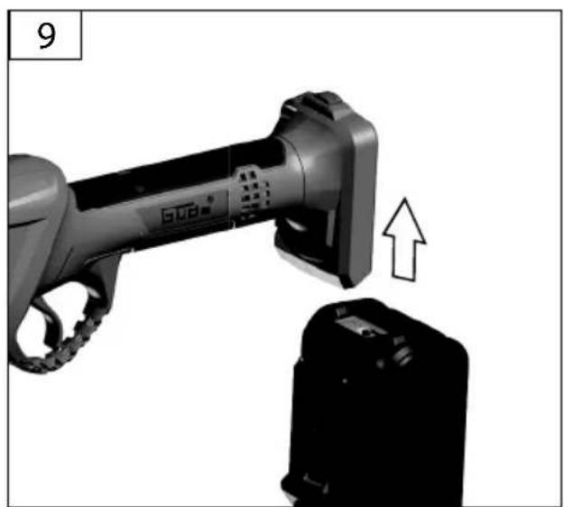 Close-up of a handheld device with a black plastic housing and an arrow indicating a change or adjustment (no text or symbols visible)