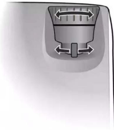 Close-up of a mechanical knob or dial with directional arrows indicating movement (no text or symbols).