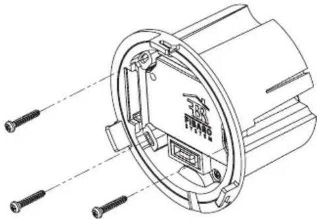 Technical line drawing of a mechanical component with screws and a central circular housing (no text or symbols)
