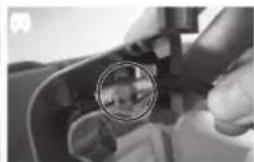 Close-up of a mechanical component with a circled detail.