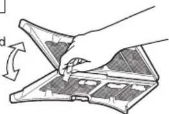 Illustration of a hand using a tool to cut or spread a component on a tray.