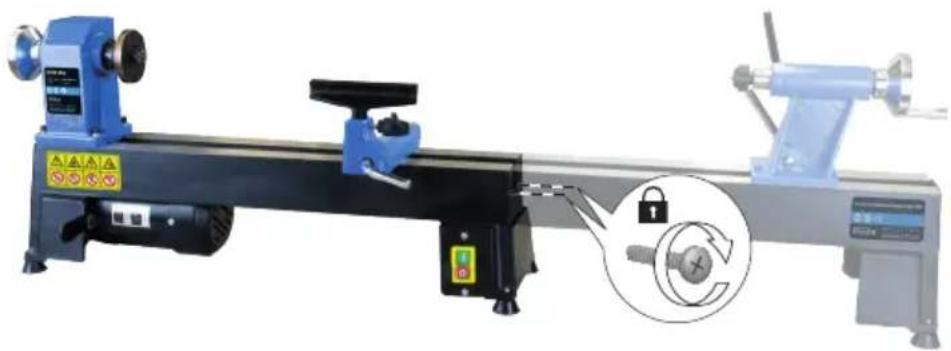Industrial machine with blue workpiece and control panel, showing mechanical components and a close-up of a lock mechanism (no text or symbols visible)