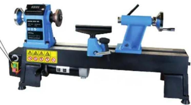 Blue and black industrial lathe machine with warning labels (no readable text or symbols)