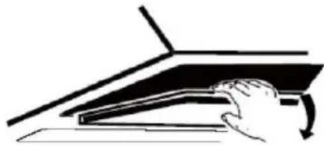 Simple line drawing of a hand pressing down on a mechanical component (no text or symbols)