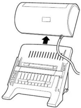 Line drawing of a printer with an open lid and cable inserted, showing internal structure (no text or symbols).