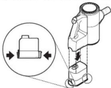 Diagram of a mechanical device with a magnified inset showing a component and directional arrows (no text or symbols)