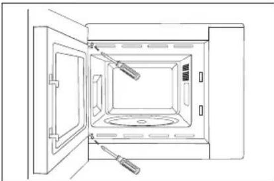 Line drawing of an open oven with a screwdriver inserted, showing internal components (no text or symbols)