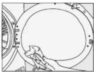 Line drawing of a hand cleaning a circular mechanical component (no text or symbols)