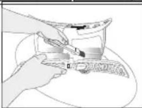 Illustration of hands using a tool to adjust or install a component, no text or symbols visible