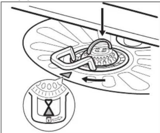 Diagram illustrating a mechanical or electrical component with directional arrows and an hourlight icon, likely for motion or control.