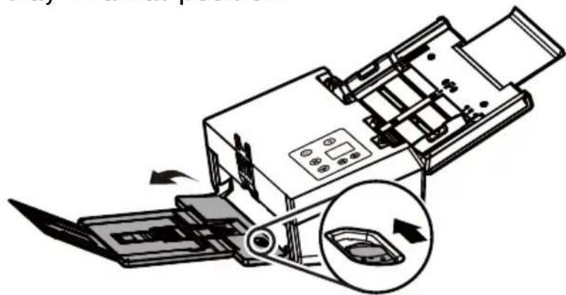 Diagram of a printer or scanner device with internal components and a magnified inset showing a small car component (no text or symbols present)