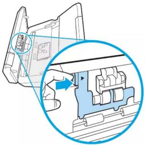 Diagram showing a hand inserting a component into a device, with a magnified inset highlighting the internal structure (no text or symbols present)