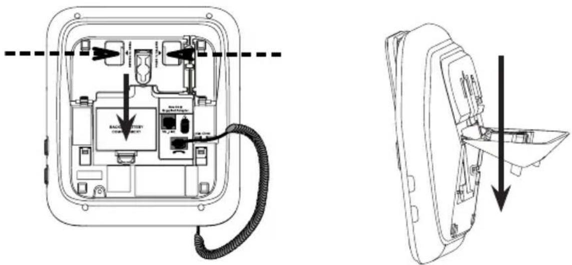 Technical diagram showing internal components of a wall-mounted device with labeled parts and directional arrows indicating assembly or disassembly.