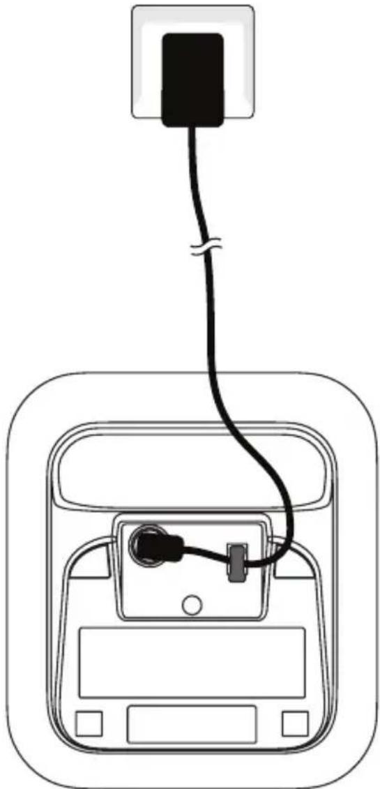 Diagram of a car front panel with cable and plug, no text or symbols present