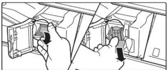 Line drawing showing hands installing or adjusting a mechanical component inside a vehicle (no text or symbols visible)