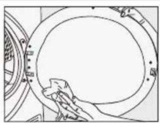 Line drawing of a hand cleaning a circular mechanical component (no text or symbols)