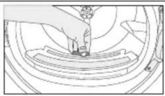 Line drawing of a mechanical assembly with a hand operating a workpiece (no text or symbols)