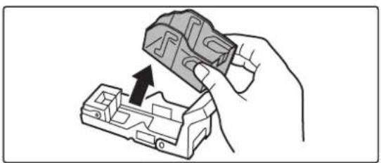 Hand holding a mechanical component with an arrow indicating assembly or insertion (no text or symbols visible).