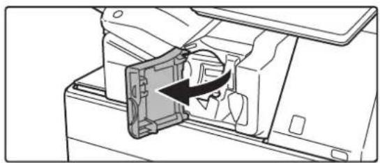 Diagram of a mechanical component with an arrow indicating a directional change or movement.