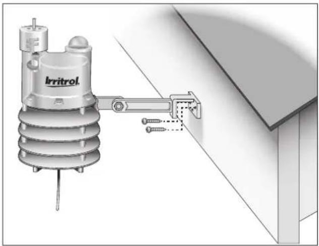 Illustration of an Irritrol electrical insulator mounted on a wall, showing mounting hardware and wiring (no text or symbols)
