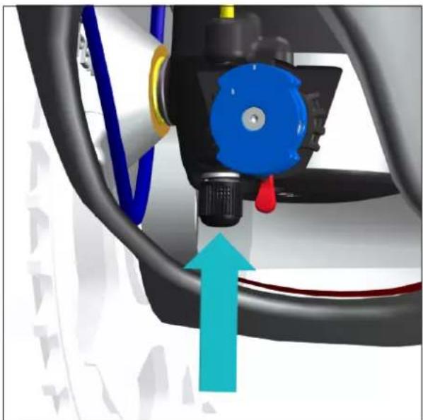 Close-up of a mechanical device with blue and black components, showing a blue valve and red handle, with a cyan upward arrow indicating motion or force (no text or symbols visible)