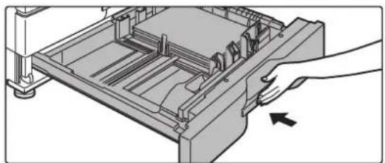 Illustration of a hand pressing down on a mechanical device component (no text or symbols visible)