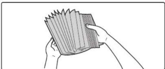 Line drawing of hands holding a fan of cards (no text or symbols)