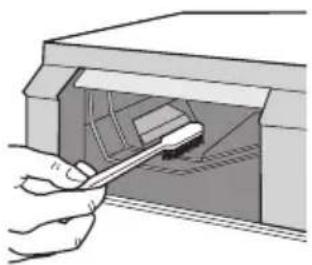 Illustration of a hand using a tool to clean or store items inside a storage cabinet (no text or symbols visible)