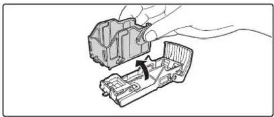Diagram showing a hand holding a mechanical component with an arrow indicating a process or transformation (no text or symbols present).