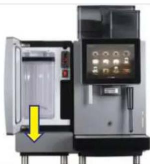 Interior view of a modern industrial machine with a yellow arrow pointing to the door panel.