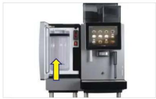 Industrial machine with open door and control panel, yellow arrow pointing to interior.