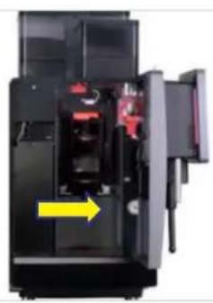 Interior view of a black electronic device with red components and a yellow arrow indicating direction (no visible text or symbols)