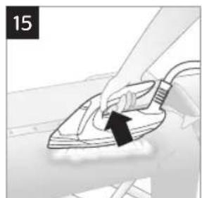 Hand using a power iron to clean or install a component, no text or symbols visible