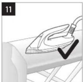 Illustration of a steam iron on a cylindrical surface, with a black checkmark indicating the mark (no text or symbols present)