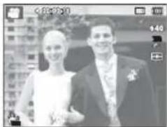 Black-and-white photo of a couple posing together, no visible text or symbols