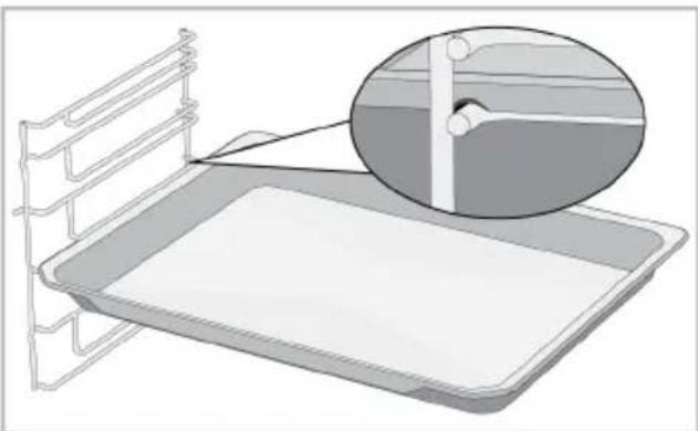 Illustration of a medical bed tray with a magnified inset showing internal structure (no text or symbols)