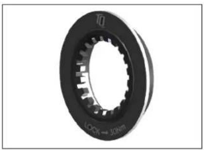 Close-up of a black mechanical gear or bearing with visible teeth and central bore (no text or symbols)