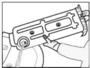 Line drawing of a hand holding a mechanical device with no visible text or symbols.