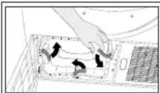 Diagram of a hand pressing down an electronic device into a rack, showing internal components and directional arrows (no text or symbols)