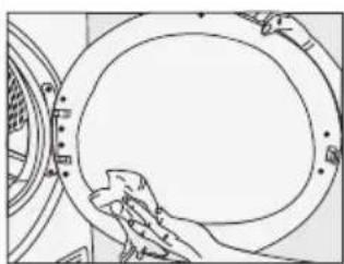 Line drawing of a hand cleaning a circular object with a ring.