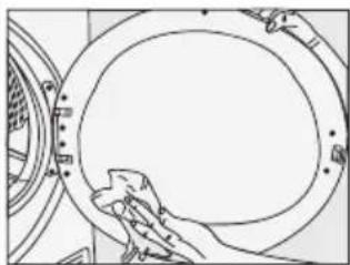 Line drawing of a hand cleaning a circular mechanical component (no text or symbols)