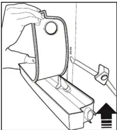 Line drawing of a hand using a tool to adjust or install a mechanical component, with no visible text or symbols.