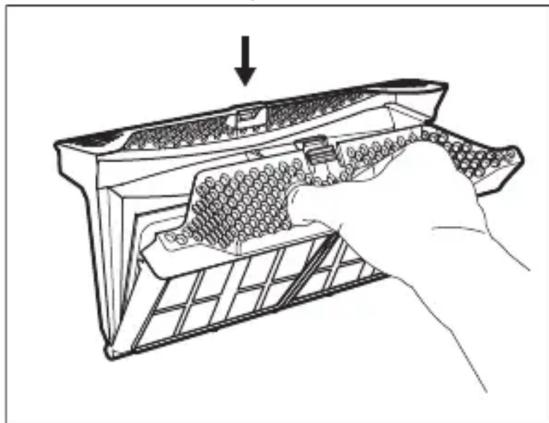 Line drawing of a hand inserting into a device into a grid-patterned panel (no text or symbols)