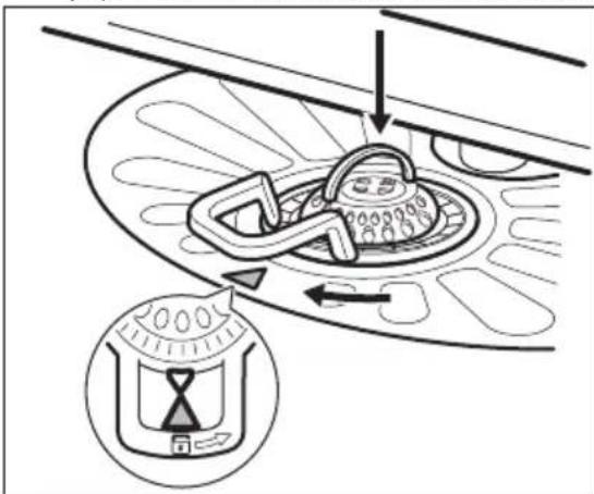 Diagram illustrating a mechanical or electrical component with directional arrows and an hourlight icon, likely from an industrial or control system.