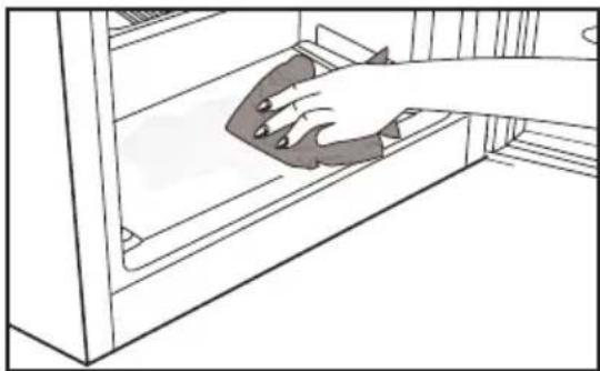 Line drawing of a hand cleaning a window with a cloth (no text or symbols).