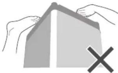 Illustration of hands holding a folded paper or document with a large 'X' symbol below (no text or symbols present).